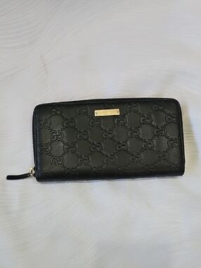 Gucci Guccisima Black Embossed Monogram Ziparound Leather Wallet AUTHENT…